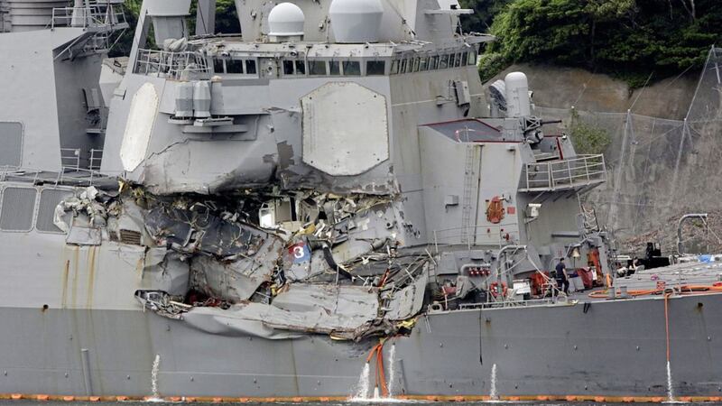 Damaged part of USS Fitzgerald is seen at the US Naval base in Yokosuka, southwest of Tokyo Sunday, June 18, 2017 PICTURE: Eugene Hoshiko 