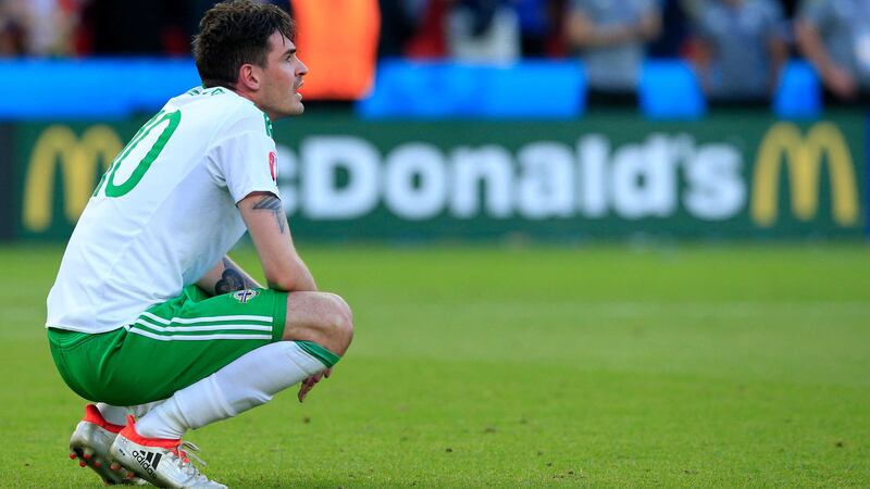 Kyle Lafferty is dejected after the 1-0 defeat by Wales&nbsp;