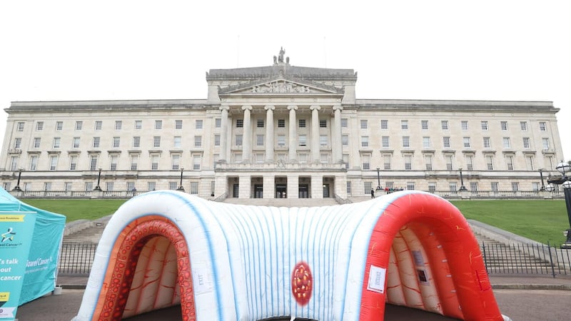 Inflatable interactive experience used to visualise the various stages of bowel cancer at the front Parliament Buildings at Stormont (Liam McBurney/PA)