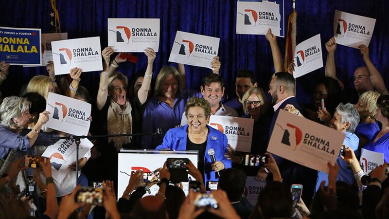 District 27 Democratic candidate Donna Shalala, center, celebrates her victory over Republican television journalist Maria Elvira Salazar at the Coral Gables Woman's Club, in Coral Gables, Florida. Picture by&nbsp;Emily Michot/Miami Herald via AP