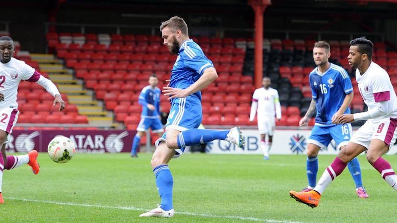 Northern Ireland&#39;s Stuart Dallas opens the scoring in Sunday night&#39;s friendly against Qatar at Gresty Road, Crewe Picture: PA 