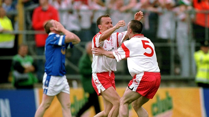 Tyrone players Pascal Canavan and Ryan McMenamin celebrate after beating Cavan in the 2001 Ulster final. It is 41 years since Cavan last beat Tyrone in the championship - although that was the last time they met in Breffni as well. Picture: David Maher / SPORTSFILE