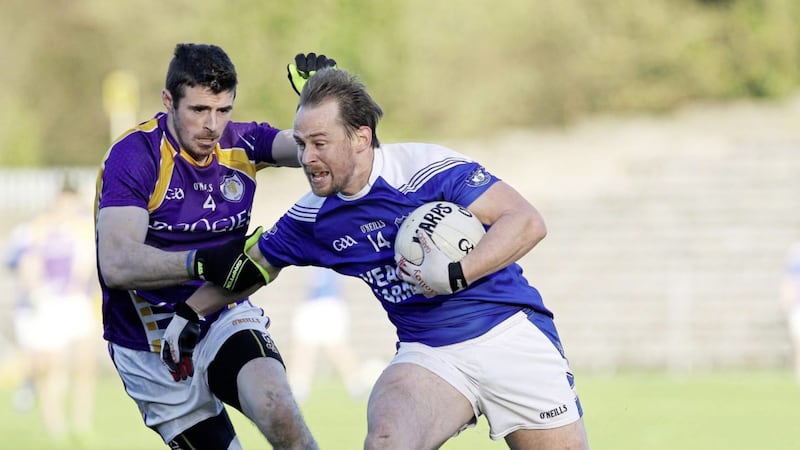 Paul O&#39;Connor of Cavan Gaels in action against Derrygonnelly&#39;s Michael Jones Picture by Philip Walsh 