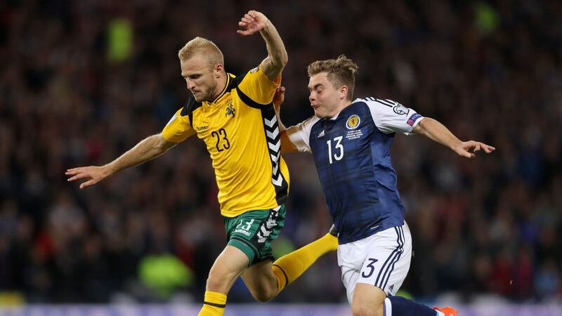 Scotland's James Forrest battles for the ball with Lithuania's Vytautas Andriuskevicius during Saturday's Fifa World Cup qualifier at Hampden Park<br />Picture by PA&nbsp;