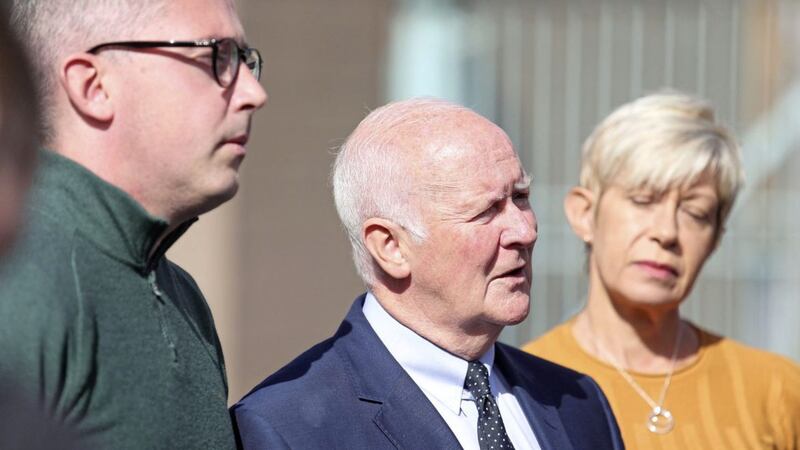 Hooded Man Liam Shannon speaks to the media along with Sinn F&eacute;in's Niall &Oacute; Donnghaile and Belfast councillor Mairead O'Donnell. Picture by Mal McCann
