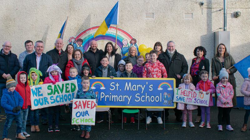 Parents and pupils of St Mary's P.S Fivemiletown celebrating after saving the school from closure.