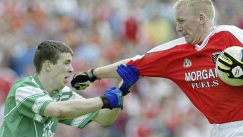 Armagh&#39;s Barry Duffy comes up against Fermanagh&#39;s Barry Owens in the 2002 Ulster SFC semi-final at Clones. Picture by Oliver McVeigh 