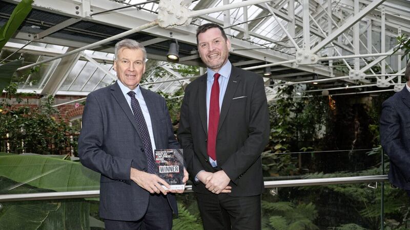 Alistair Stewart (right), head of public engagement at Queen&rsquo;s University Belfast, pictured at the launch of the Workplace &amp; Employment Awards with Irish News editor Noel Doran. Picture: Hugh Russell 