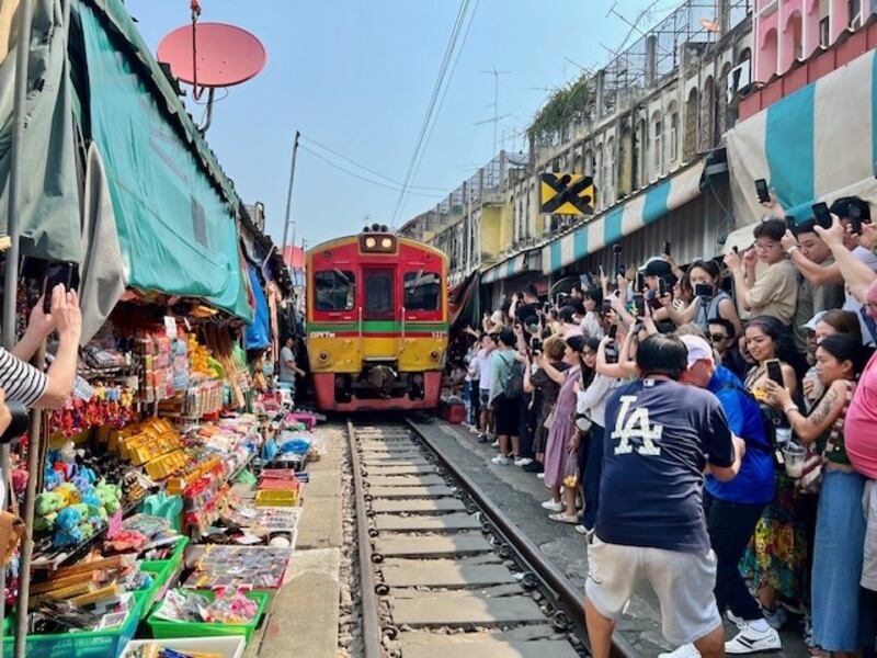 A must-see is the Railway Market at Maeklong where goods are sold on the tracks and moved as a train approaches