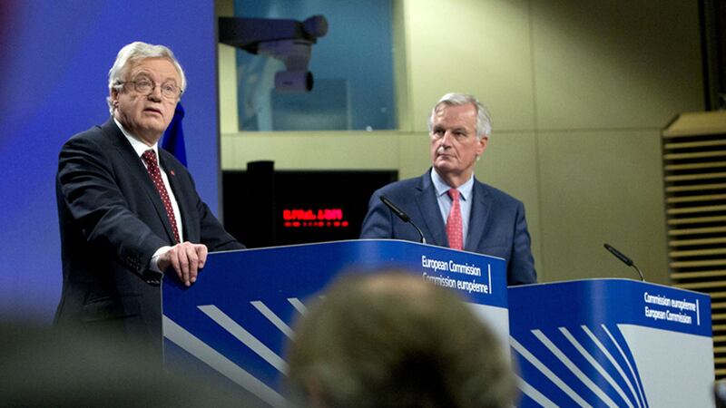 European Union chief Brexit negotiator Michel Barnier, right, and British Secretary of State for Exiting the European Union David Davis participate in a media conference at EU headquarters in Brussels&nbsp;