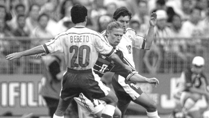 France&rsquo;s Arsenal midfielder Emmanuel Petit forces his way through the tackles of Brazil&rsquo;s Bebeto and Leonardo during the host country&rsquo;s victory in last night&rsquo;s World Cup final in the Stade de France 