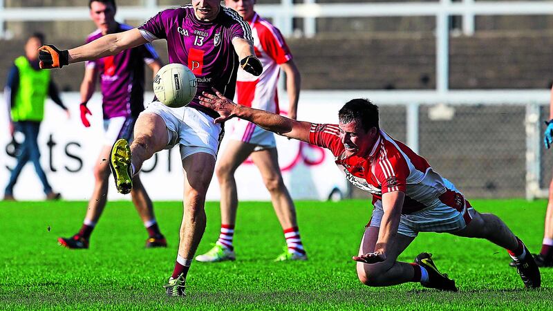 Bredagh&rsquo;s Donal Hughes is challenged by Donaghmoyne&rsquo;s Cillian Coleman during yesterday&rsquo;s clash at Pairc Esler, Newry. Picture by Philip Walsh