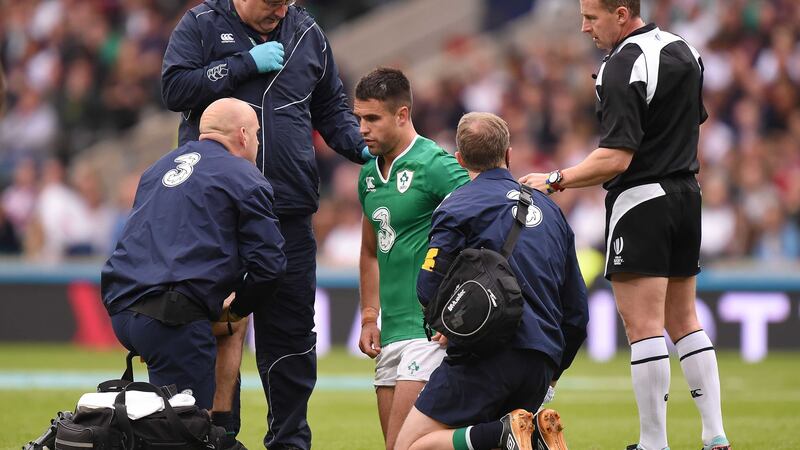 Ireland's Conor Murray is treated after picking up a head injury during the World Cup warm-up match against England at Twickenham earlier this month<br />Picture: PA