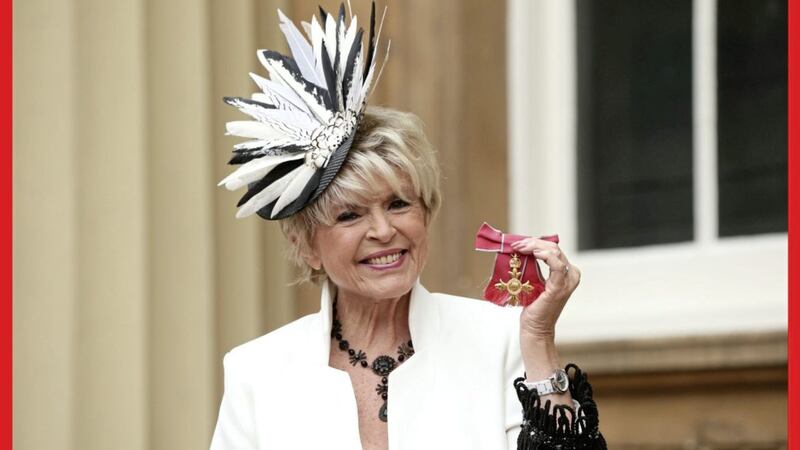 Broadcaster Gloria Hunniford is made an OBE (Officer of the Order of the British Empire) by Queen Elizabeth. Picture by Jonathan Brady/PA Wire 