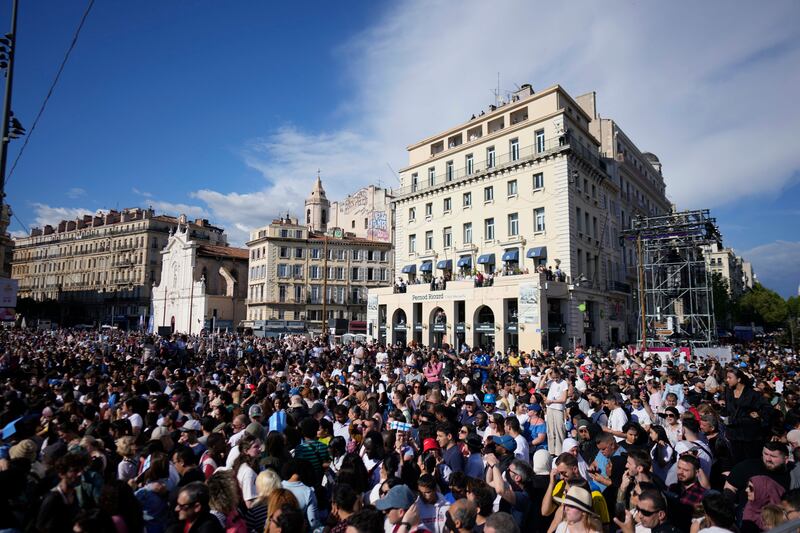 People wait ahead of the arrival of the Belem in Marseille (Thibault Camus/AP)