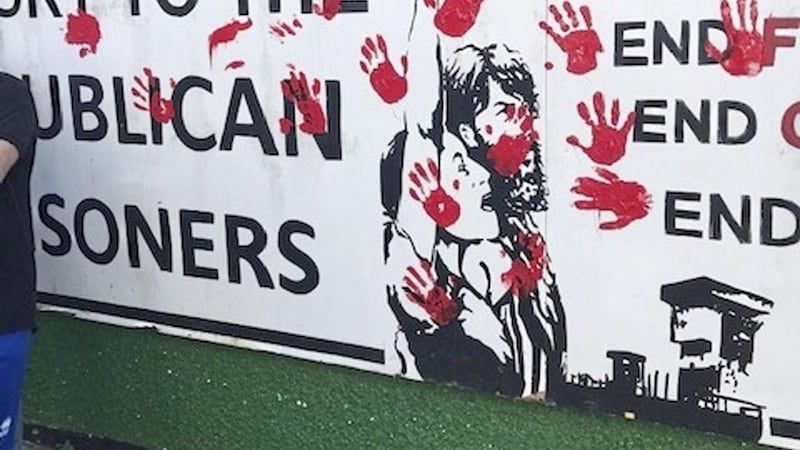 Friends of murdered journalist Lyra McKee daubed red hand prints on Derry&#39;s Junior McDaid House 