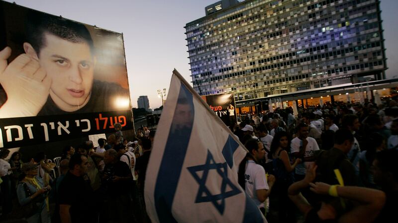 Israelis call for the release of abducted Israeli soldier Gilad Shalit in 2008, in Tel Aviv (Ariel Schalit/AP)