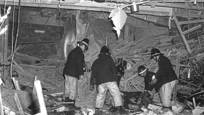 Firemen at work following the bomb attacks in Birmingham city centre that targeted the Mulberry Bush pub and the Tavern in the Town. Picture by PA Wire