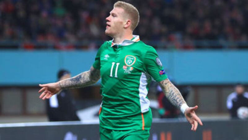 James McClean wheels away after scoring what proved to be the winner in Saturday&rsquo;s 1-0 win over Austria in the World Cup Qualifying Group D clash in Vienna. Picture by PA