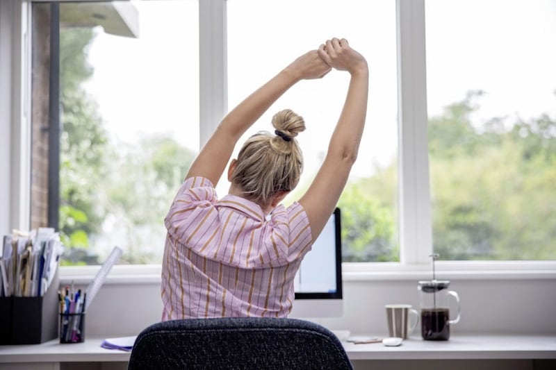 Even simple stretches can help after sitting at a desk for long periods. 