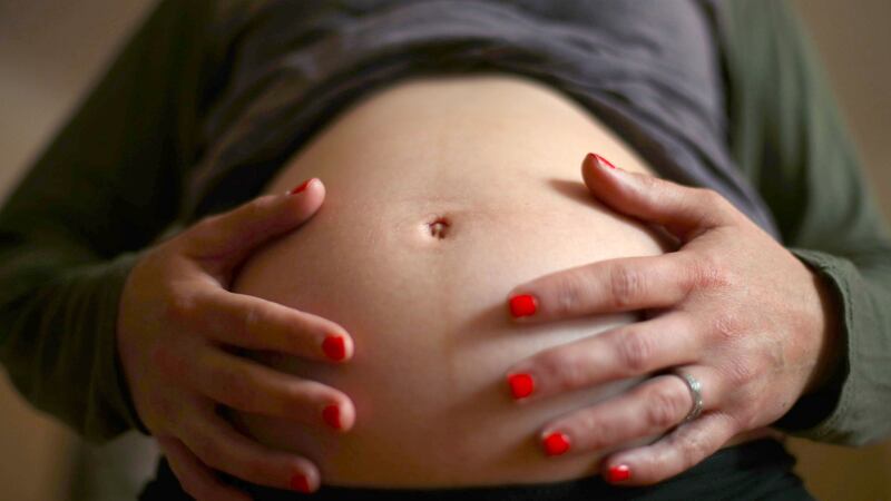 Current practice in the UK and Scandinavia is to induce delivery for women who have not gone into labour by 42 weeks.