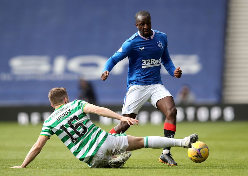 Rangers' Glen Kamara (right) and Celtic's Jonjoe Kenny battle for the ball during the Scottish Premiership match at Ibrox Stadium, Glasgow on Sunday May 2, 2021.&nbsp;<span style="font-family: Arial, sans-serif; ">Picture by Jane Barlow/PA Wire.</span>