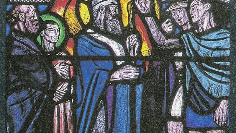 St Patrick features in many works of Church art, including stained glass. Here he is pictured in a window at St Cedma&#39;s Church in Larne, confronting messengers sent by King Laoghaire. The window was designed by Wilhelmina Geddes. Picture by Paul Larmour. 