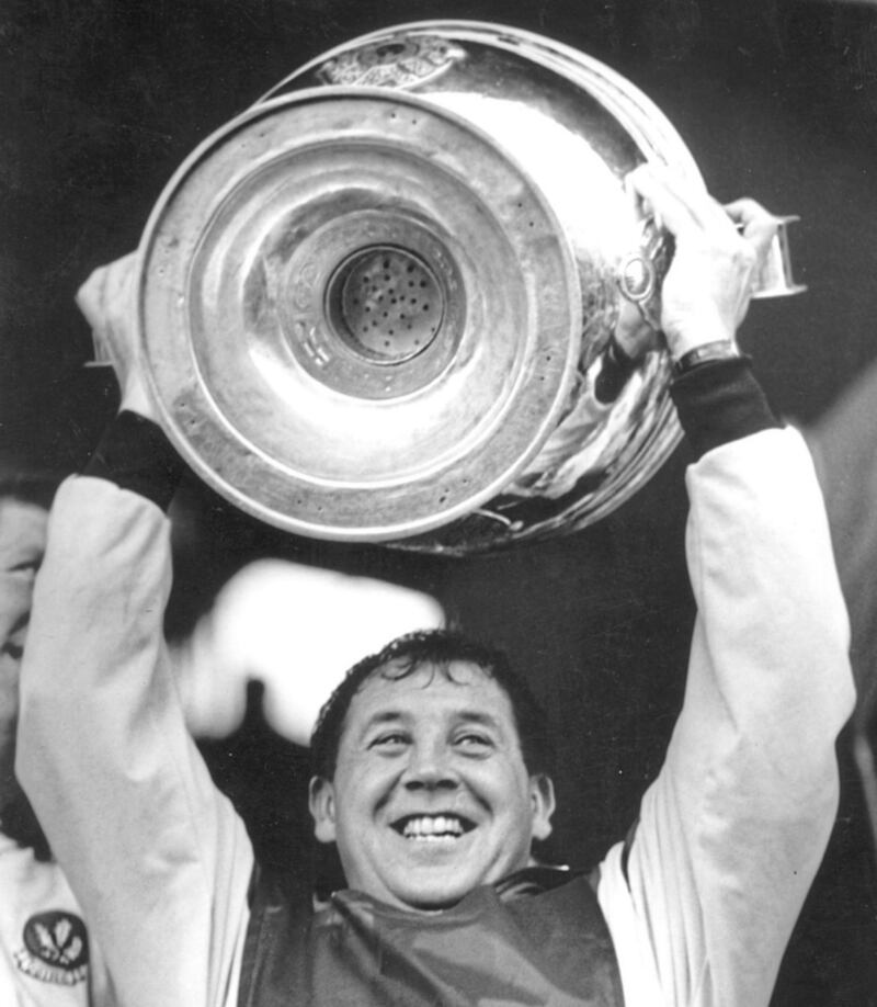 Former Derry manager Eamonn Coleman lifts the Sam Maguire Cup in 1993 