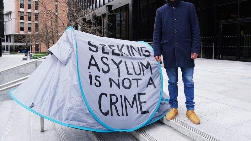 Mahmoud Al-Azab, who currently shelters in a tent outside the International Protection Office on Mount Street, stands outside the Department of Integration in Dublin