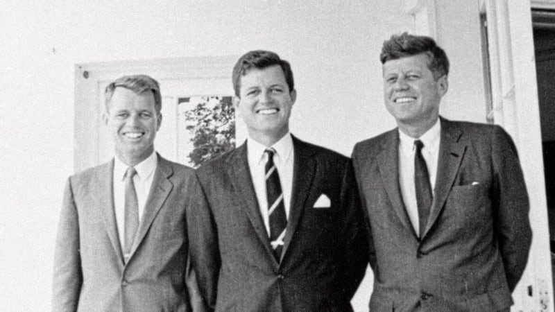 President John F Kennedy is pictured in 1962 with his brothers Robert and Edward. Their great-grandfather emigrated from New Ross in Co Wexford in 1848 (AP Photo) 