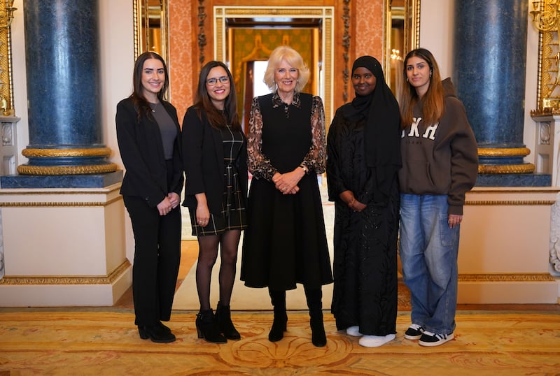 Queen Camilla (centre) with Changemakers Imi, Maya, Almas and Lybah