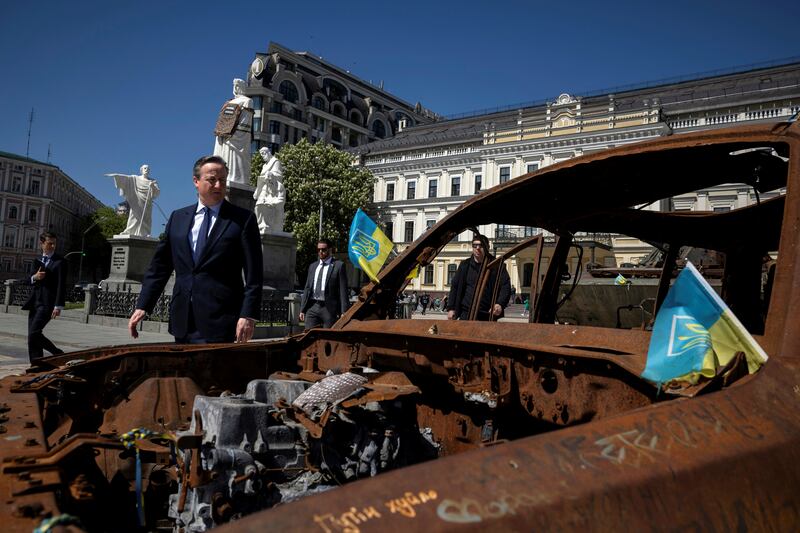 Lord Cameron saw Russian vehicles that have been destroyed (Thomas Peter/AP)