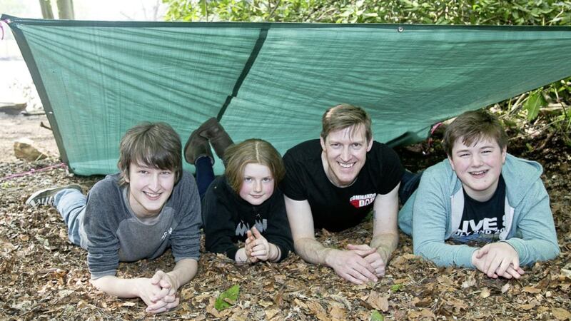 &#39;Commando Dad&#39; Neil Sinclair with his three children Samuel, Jude and Liberty 