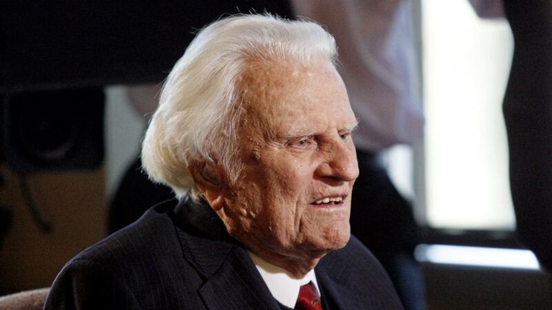 Evangelist Billy Graham, then aged 92, speaks during an interview at the Billy Graham Evangelistic Association headquarters in Charlotte, North Carolina. Graham, who transformed American religious life through his preaching and activism, becoming a counselor to presidents and the most widely heard Christian evangelist in history, has died. He was 99 PICTURE: Nell Redmond/AP 
