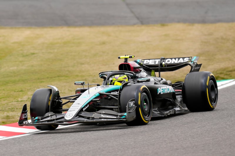 Mercedes driver Lewis Hamilton of takes part in the first free practice session at Suzuka. (Hiro Komae/AP)