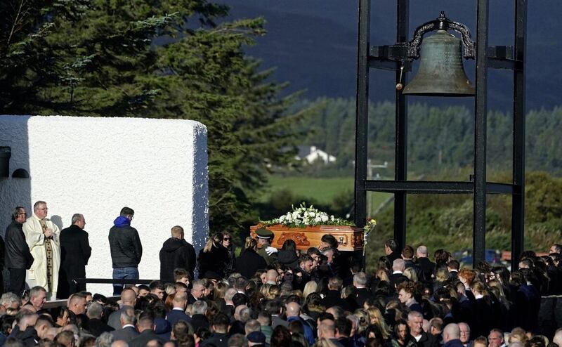 Martina Martin's coffin is carried into St Michael's Church in Creeslough for her funeral Mass. Picture by Brian Lawless, PA