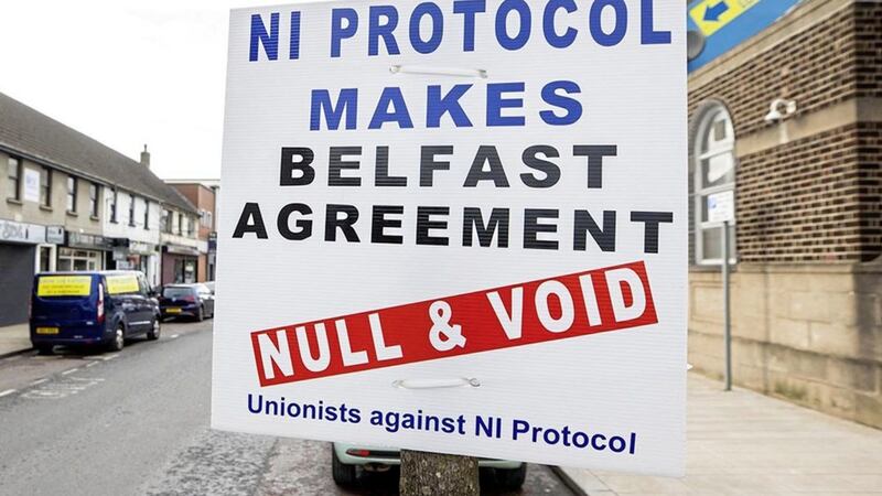 A sign by Unionists against NI Protocol on Main Street in Larne with the text, &#39;NI Protocol makes Belfast Agreement (Also known as the GFA or Good Friday Agreement) Null and Void&#39;. Picture date: Monday March 8, 2021. PA Photo. See PA story POLITICS Brexit. Photo credit should read: Liam McBurney/PA Wire. 