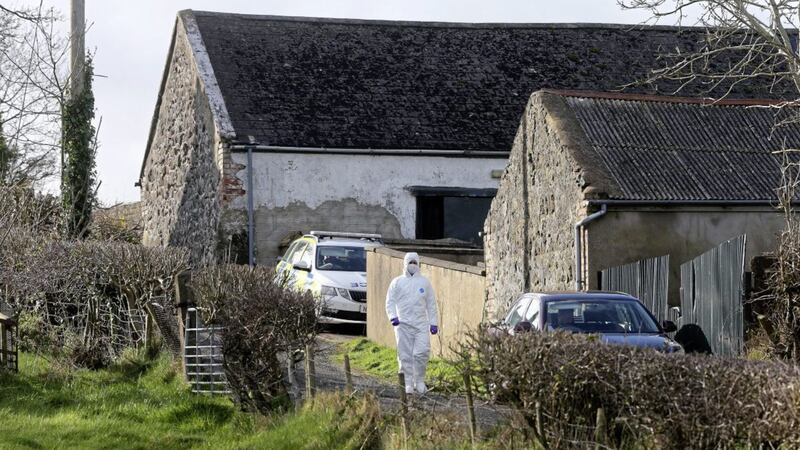 Forensic officers at a farmhouse in Magheramorne outside Larne. A child died and a woman and baby are being treated in hospital following a stabbing. Picture by Mal McCann 