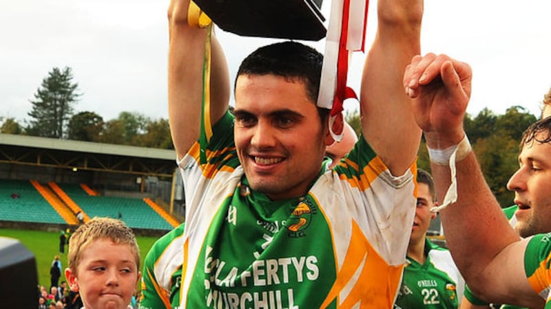 &nbsp;Glenswilly captain James Pat McDaid raises the trophy