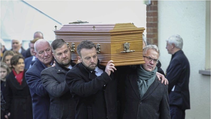 SDLP colleagues carry the coffin of Seamus Mallon at his funeral in Mullaghbrack, Co Armagh. Picture by Hugh Russell 
