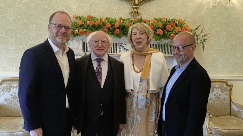 Journalists Trevor Birney and Barry McCaffrey are pictured with Irish President Michael D Higgins and his wife Sabina 