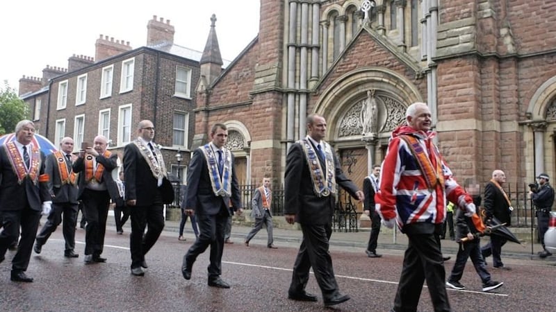 &nbsp;Members of the Orange Order marching past St Patrick's Church on Donegall Street in Belfast. Picture by Matt Bohill