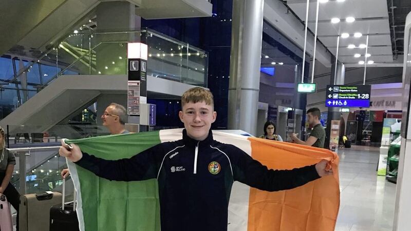 John Paul Hale celebrates at Dublin airport on Sunday after returning home with a silver medal from the Brandenburg Cup in Germany 