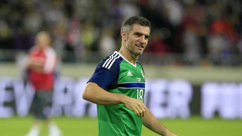 Aaron Hughes says he won't rush his decision on whether or not to retire from international football after a successful Euro 2016 campaign&nbsp;