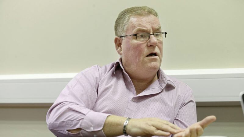 Harry Maguire of Community Restorative Justice talks to the Irish News in 2012. Picture by Hugh Russell. 