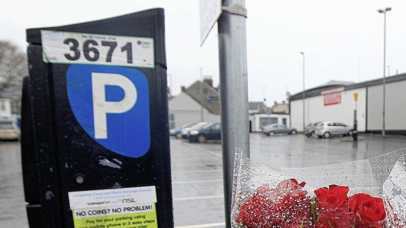 Flowers at the scene of a fatal collision in Coleraine where a woman died on Friday. Picture by Margaret McLaughlin 