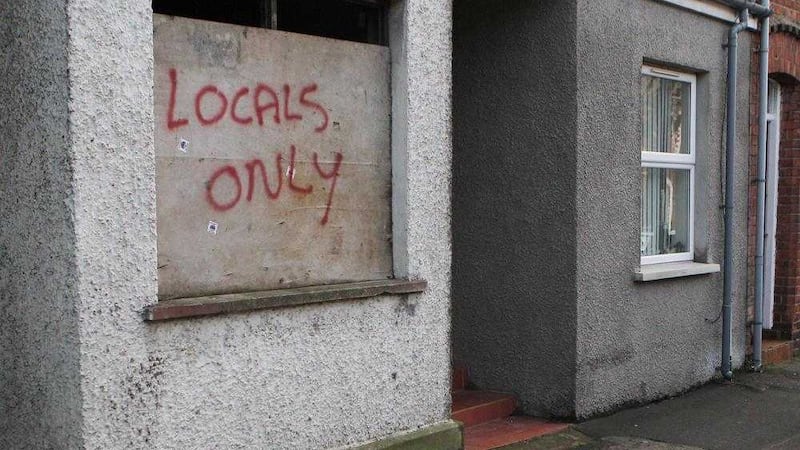 Racist graffiti has appeared on a derelict property in the Village area of south Belfast. Picture by Matt Bohill 