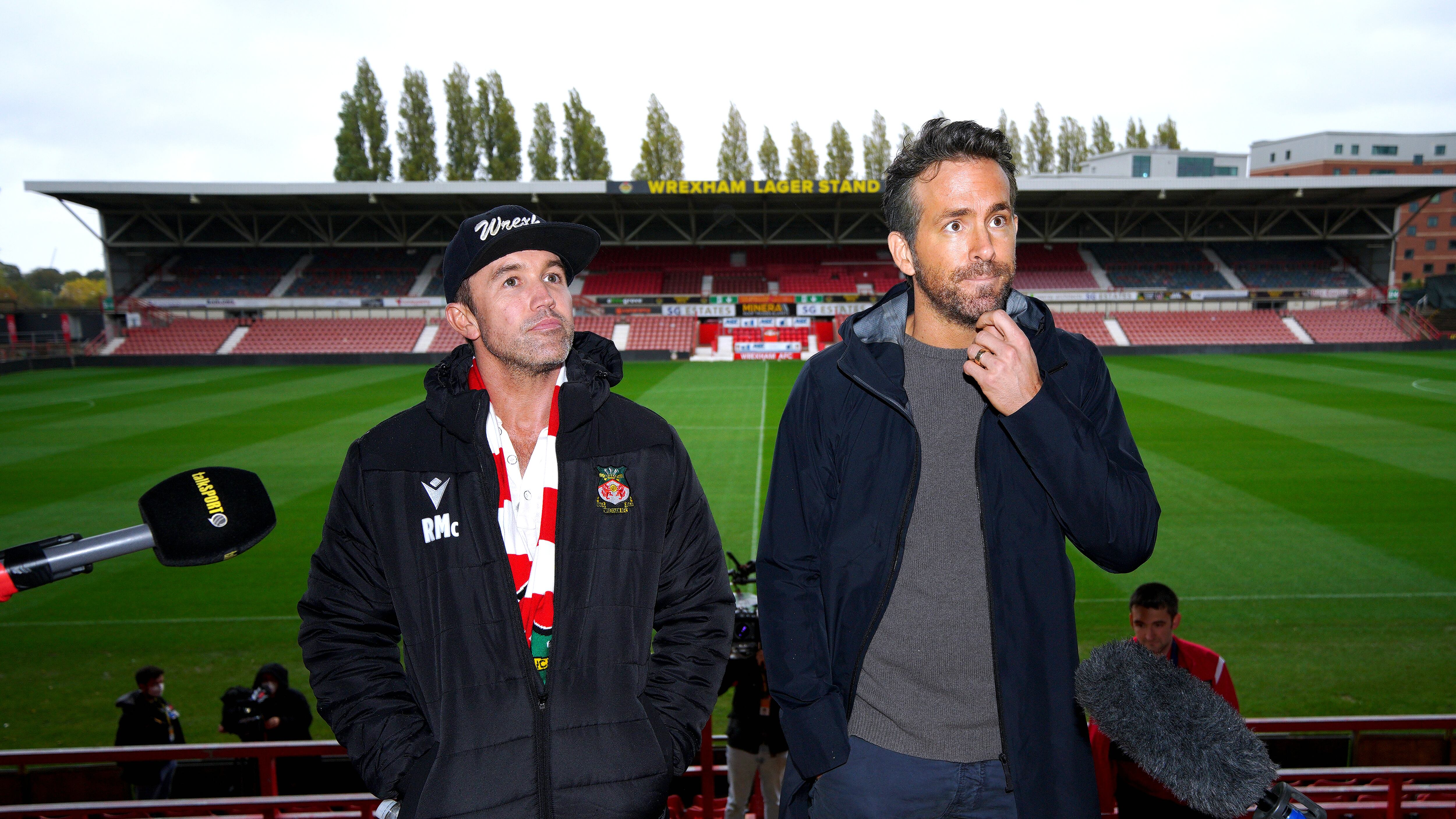 Wrexham owners Rob Elhenney (left) and Ryan Reynolds have ambitious plans to develop the ground so “the whole town could come to a game”