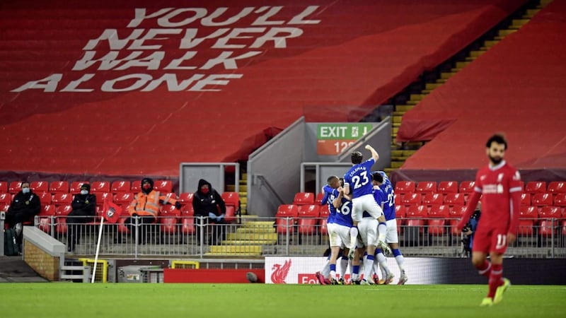 Everton celebrate as champions Liverpool suffer a fourth consecutive home defeat. 