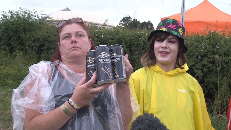 Sandra holding a pack of ciders